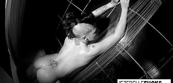  Brunette babe Jezebelle gets steamy in the shower